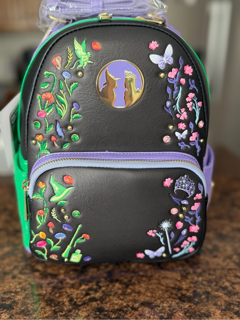 Loungefly Black Mini Backpack with Purple & Green Floral Embroidery